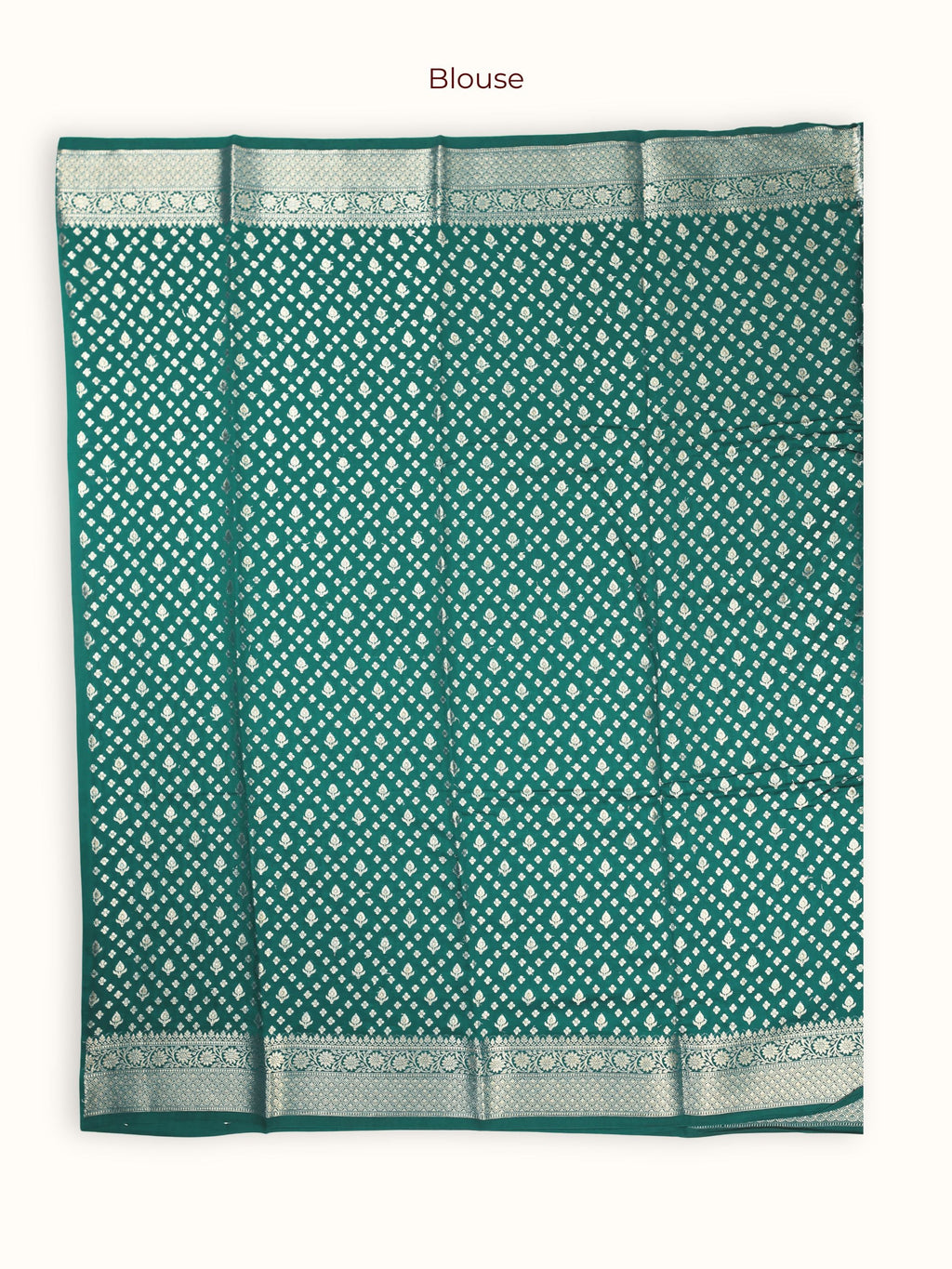 The unstitched blouse piece in deep green with silver chevrons