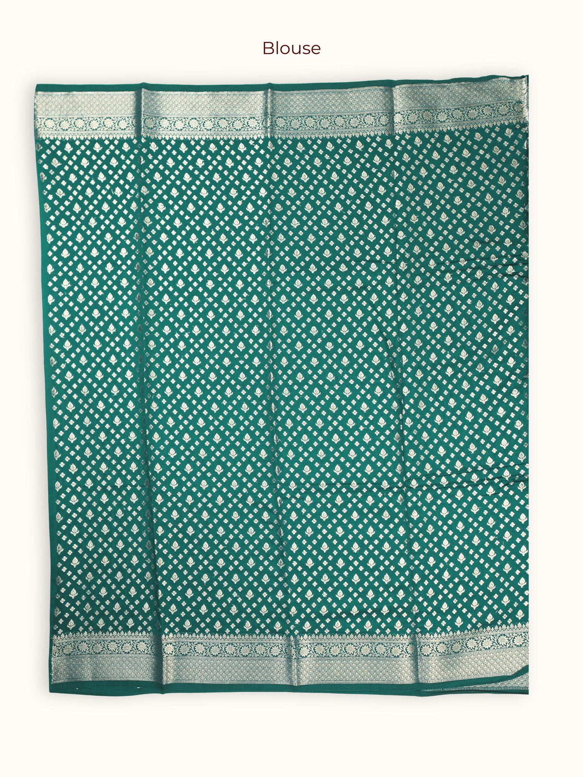 The unstitched blouse piece in deep green with silver chevrons
