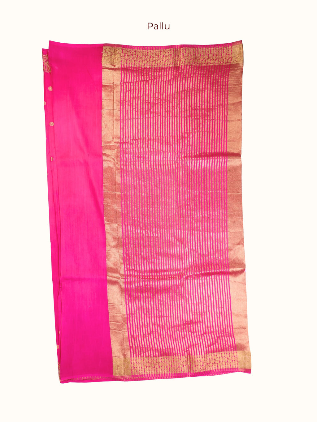 The pallu, fine gold stripes framed by a band of round florals