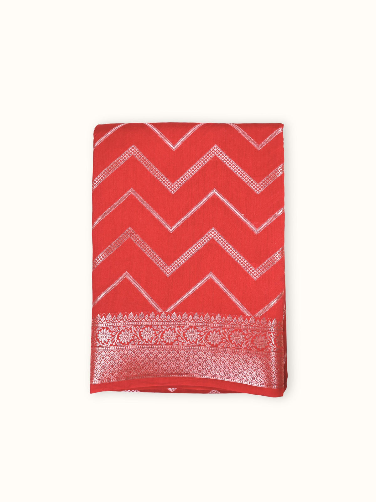 Scarlet Chiniya silk saree folded, silver chevron weave across the body