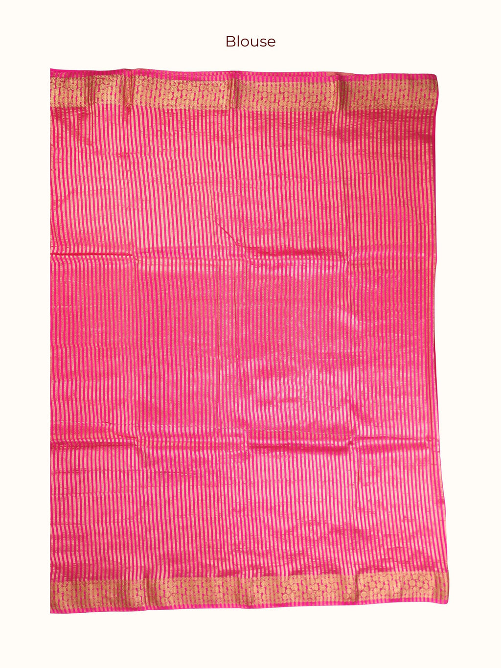 The unstitched blouse piece in fuchsia pink with gold stripes