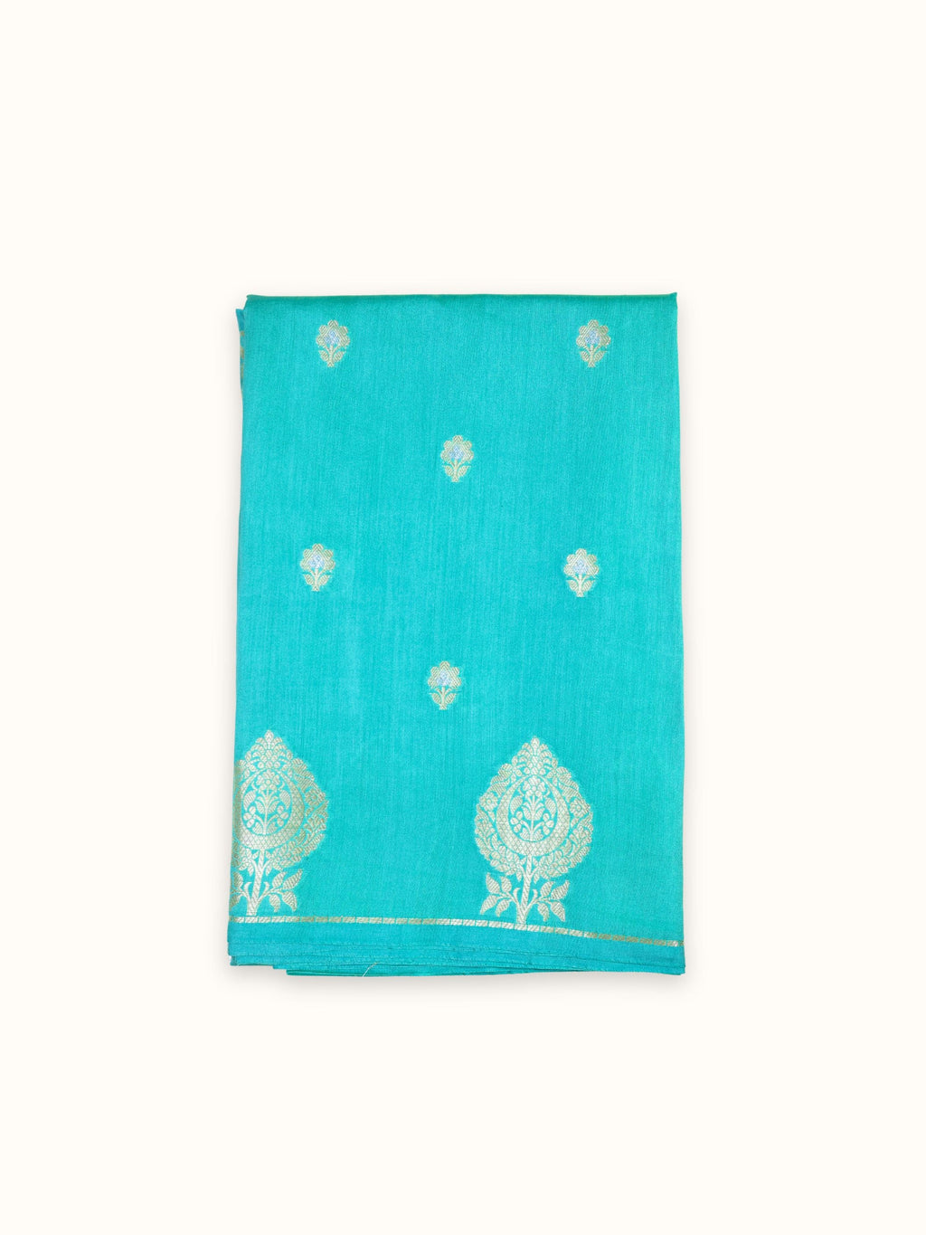 Turquoise Chiniya silk saree folded, gold cone butis