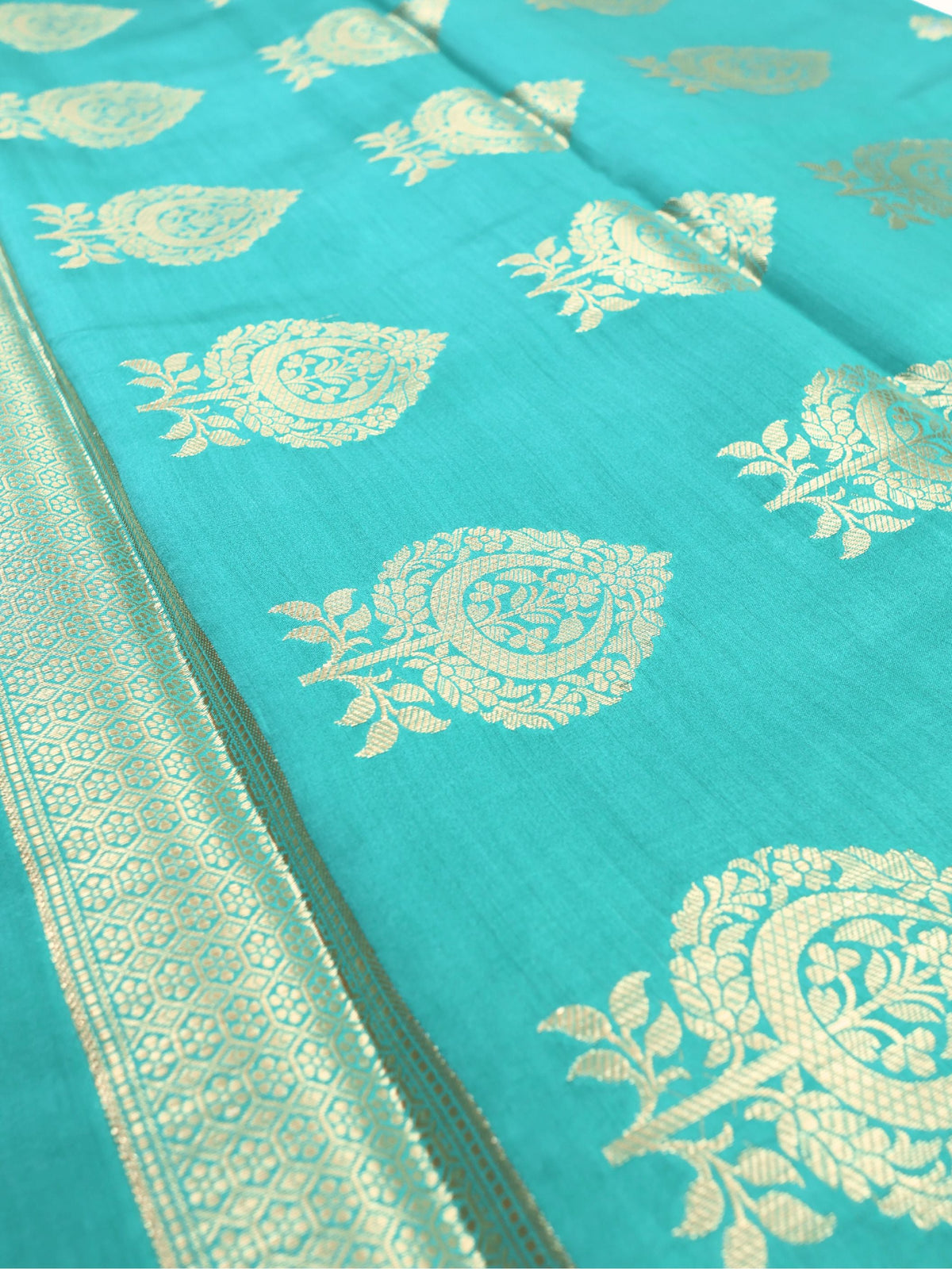Close detail of the gold paisley work on turquoise silk
