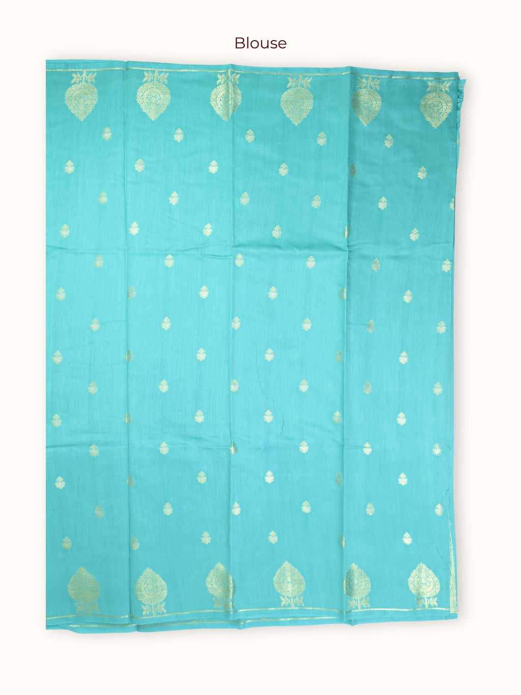 The unstitched blouse piece in turquoise with gold butis