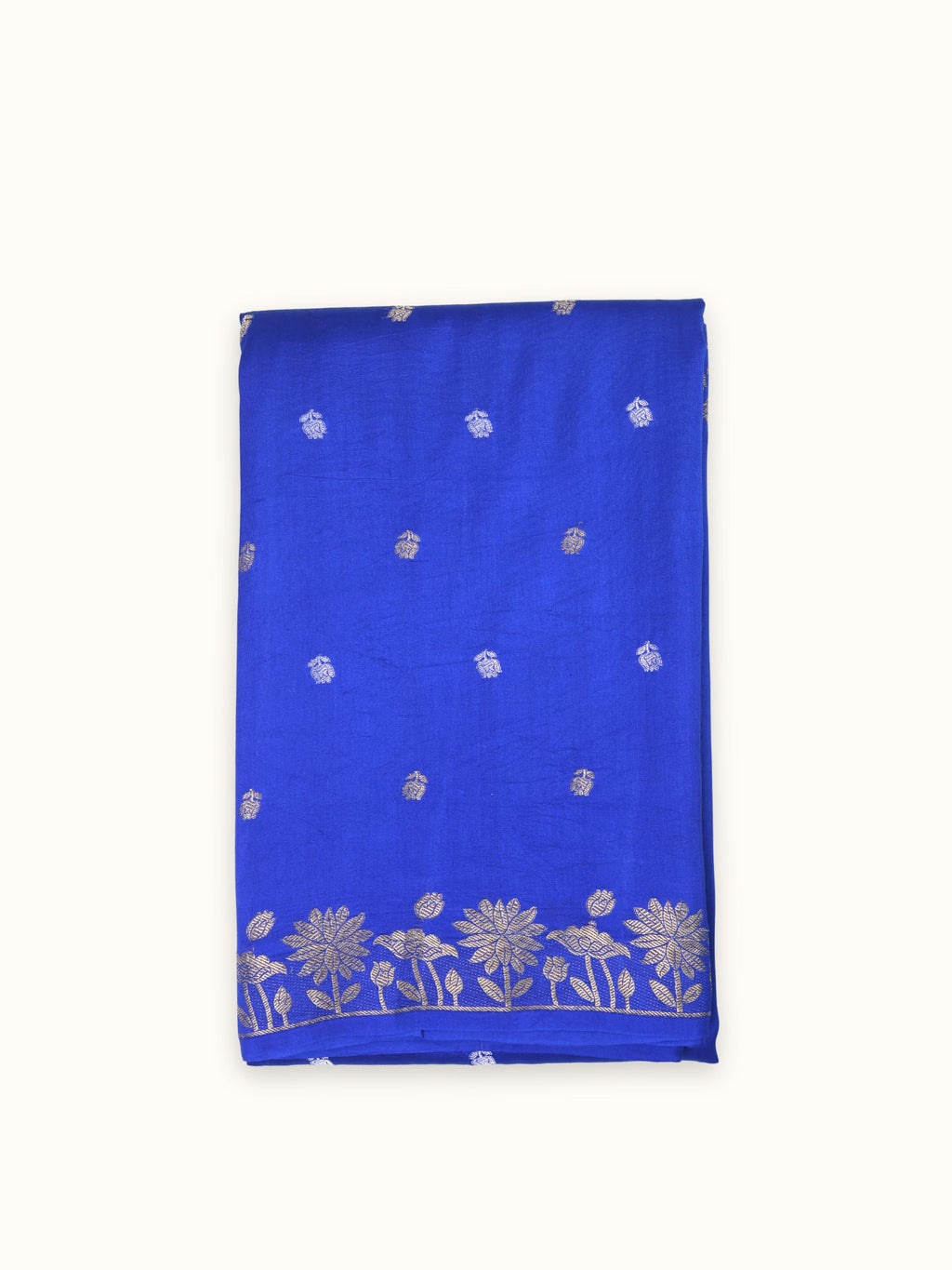 Royal blue Chiniya silk saree folded, scattered silver butis