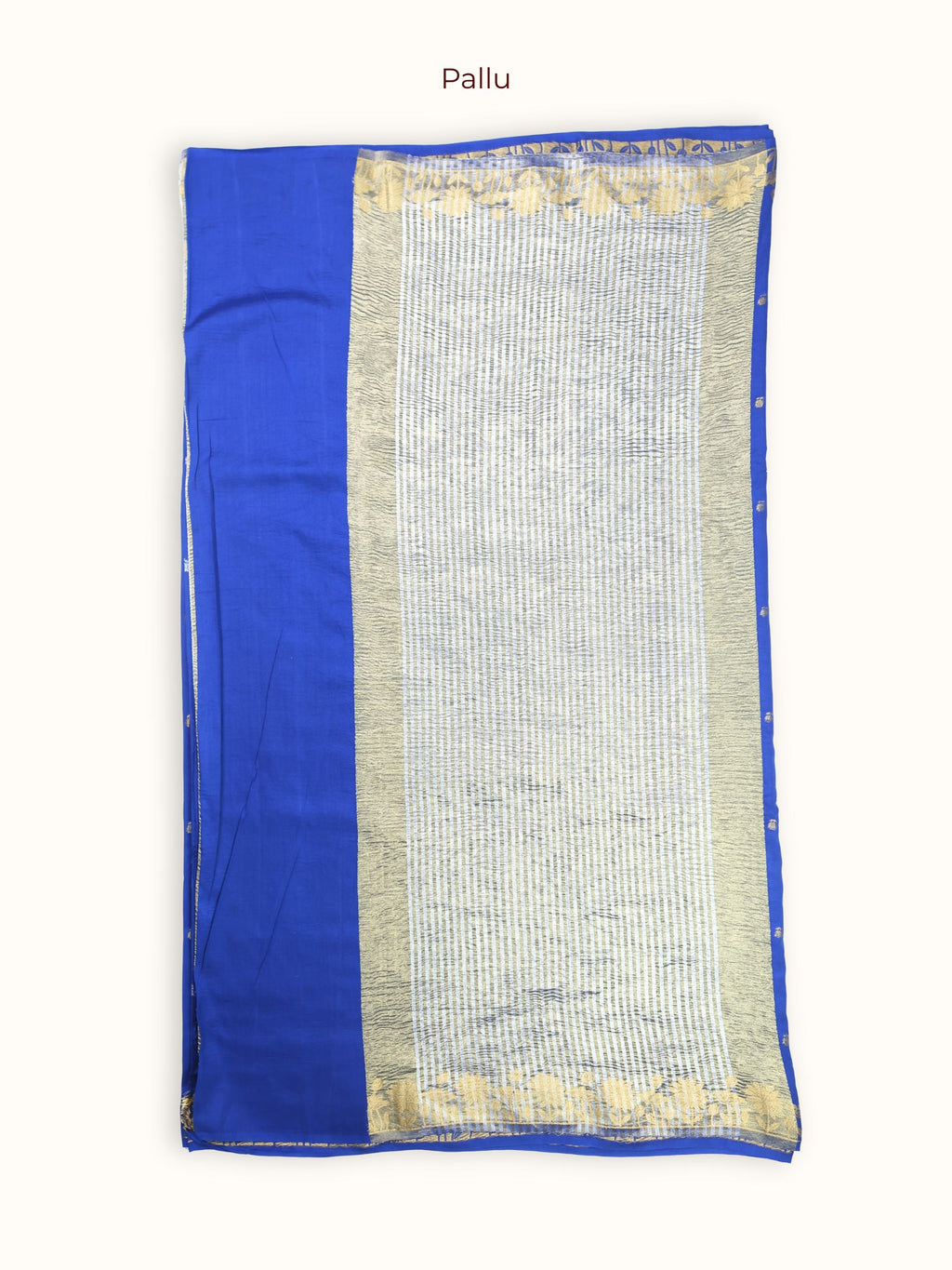 The pallu, a broad panel of gold and silver woven in a fine check
