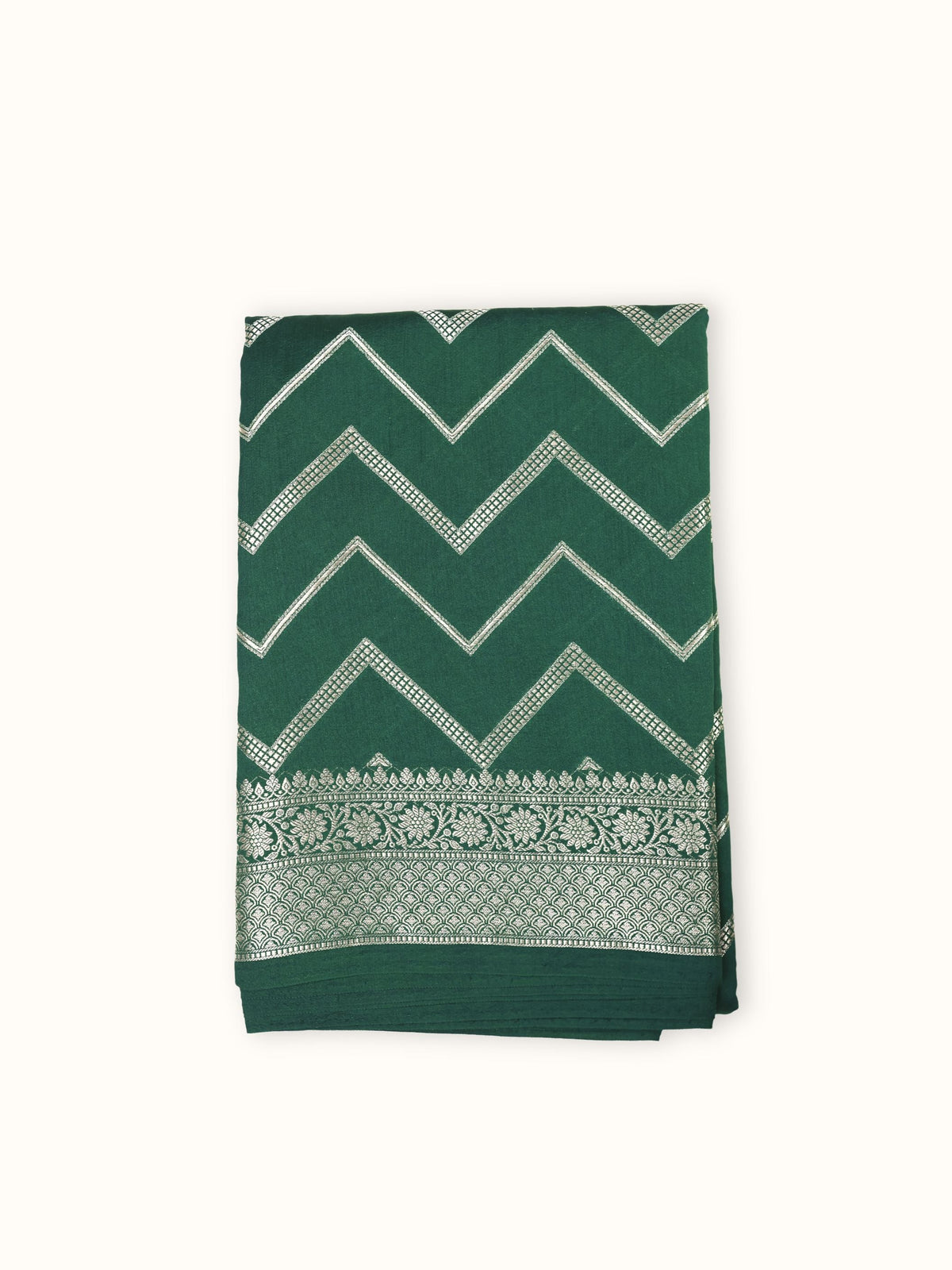 Deep green Chiniya silk saree folded, silver chevron weave