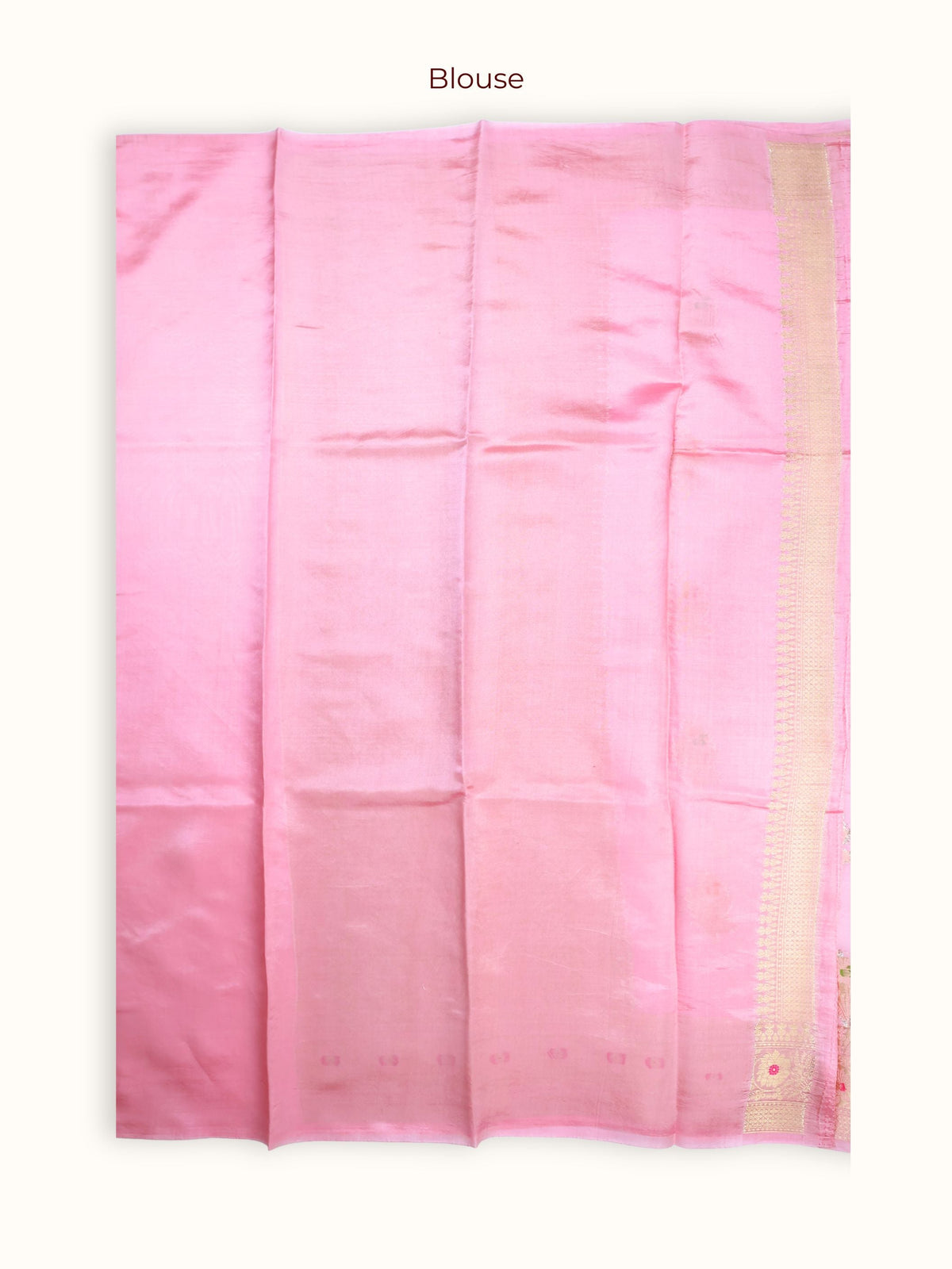 The unstitched blouse piece in rose pink with gold zari