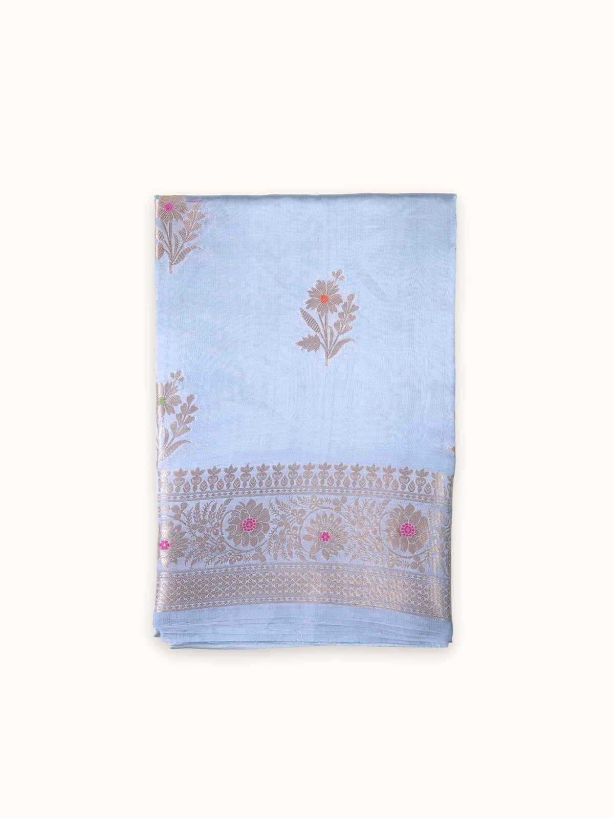 Powder blue Dupian silk saree folded, gold floral butis