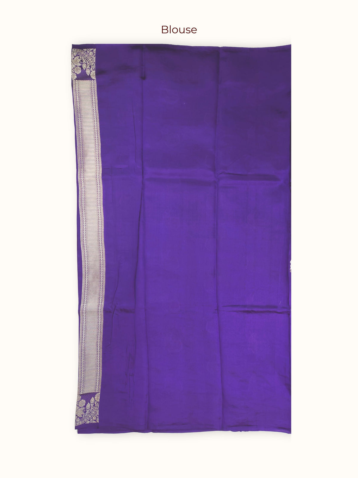 The unstitched blouse piece in violet with silver zari