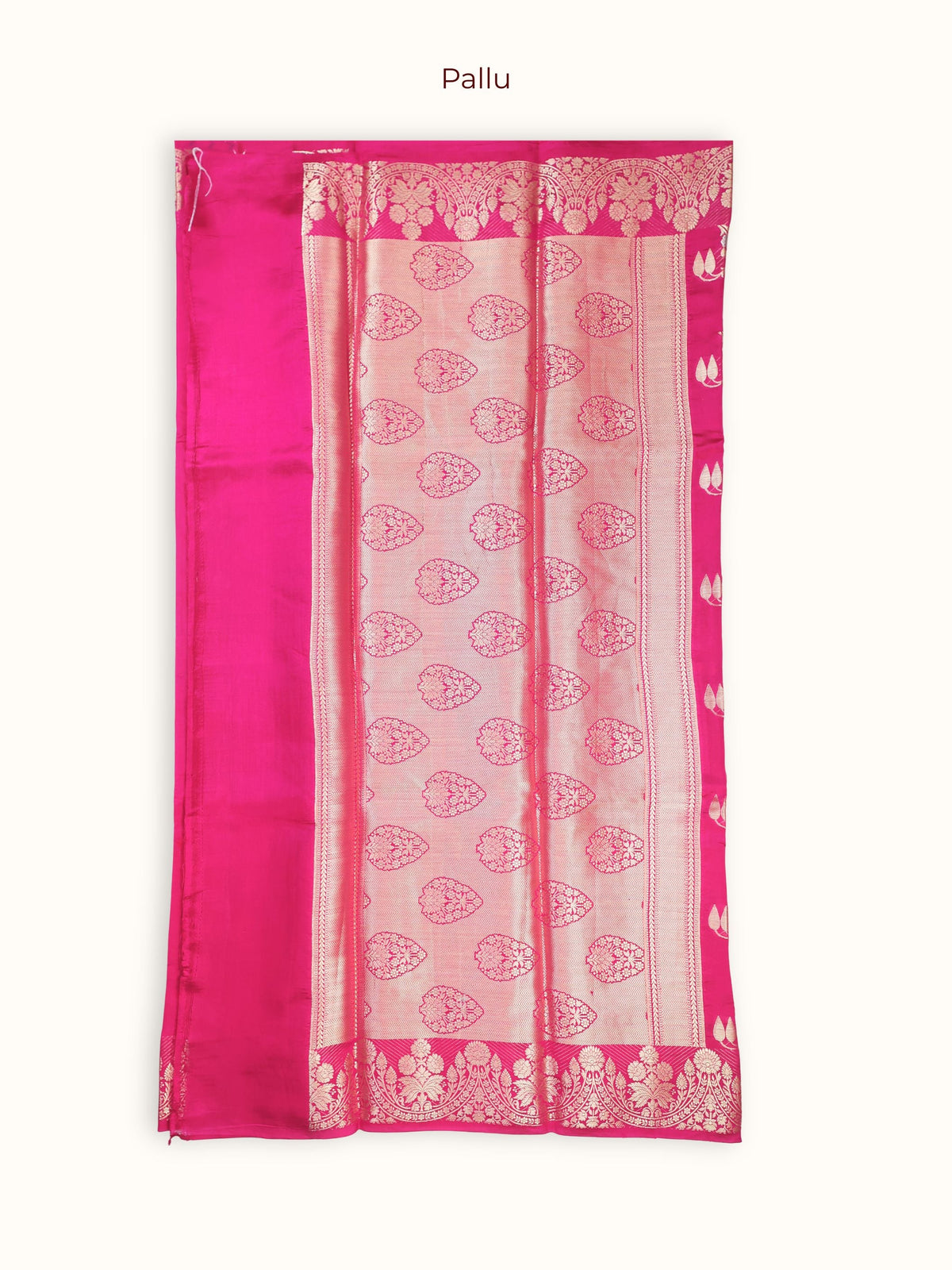 The pallu, large silver paisleys in rows closed with chevrons