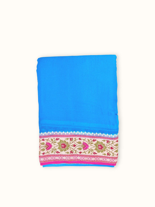 Azure Blue Chiffon Saree with Magenta Meenakari Pallu, folded