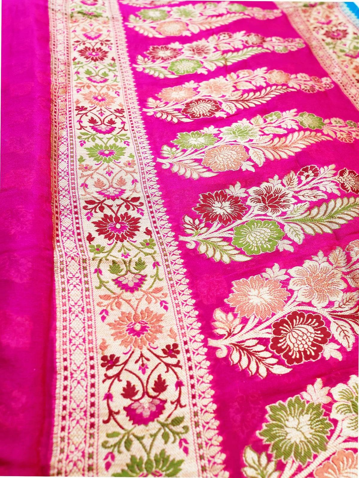 Azure Blue Chiffon Saree with Magenta Meenakari Pallu, close detail of the weave