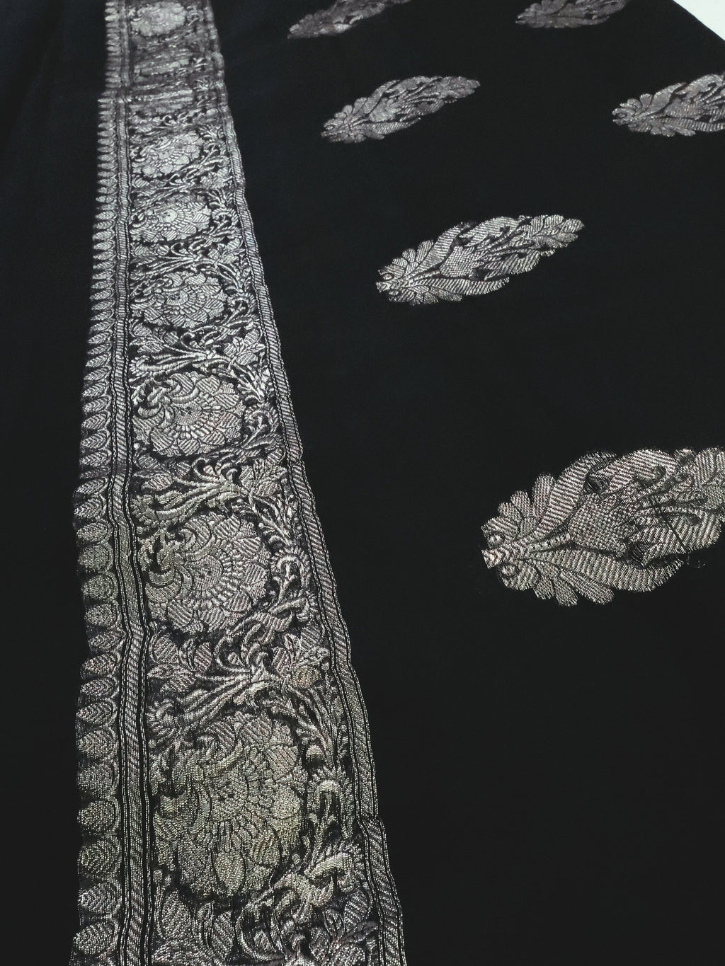 Black Khaddi Chiffon Handloom Saree with Silver Kadua Butis, close detail of the weave