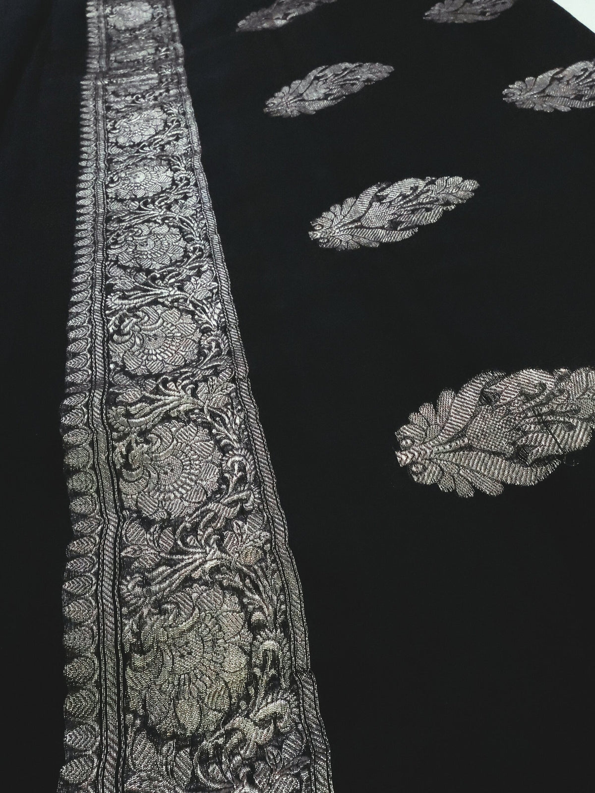 Black Khaddi Chiffon Handloom Saree with Silver Kadua Butis, close detail of the weave