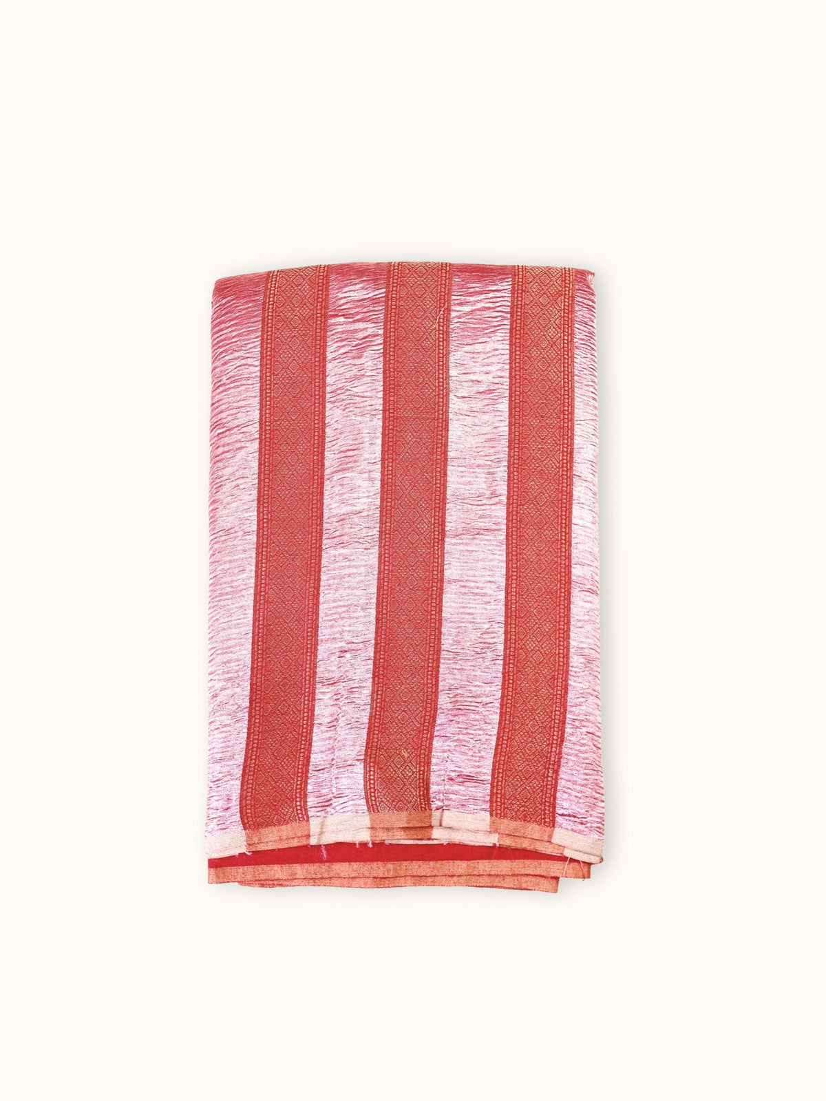 Coral red Muga stripe silk saree folded, with silver tissue stripes