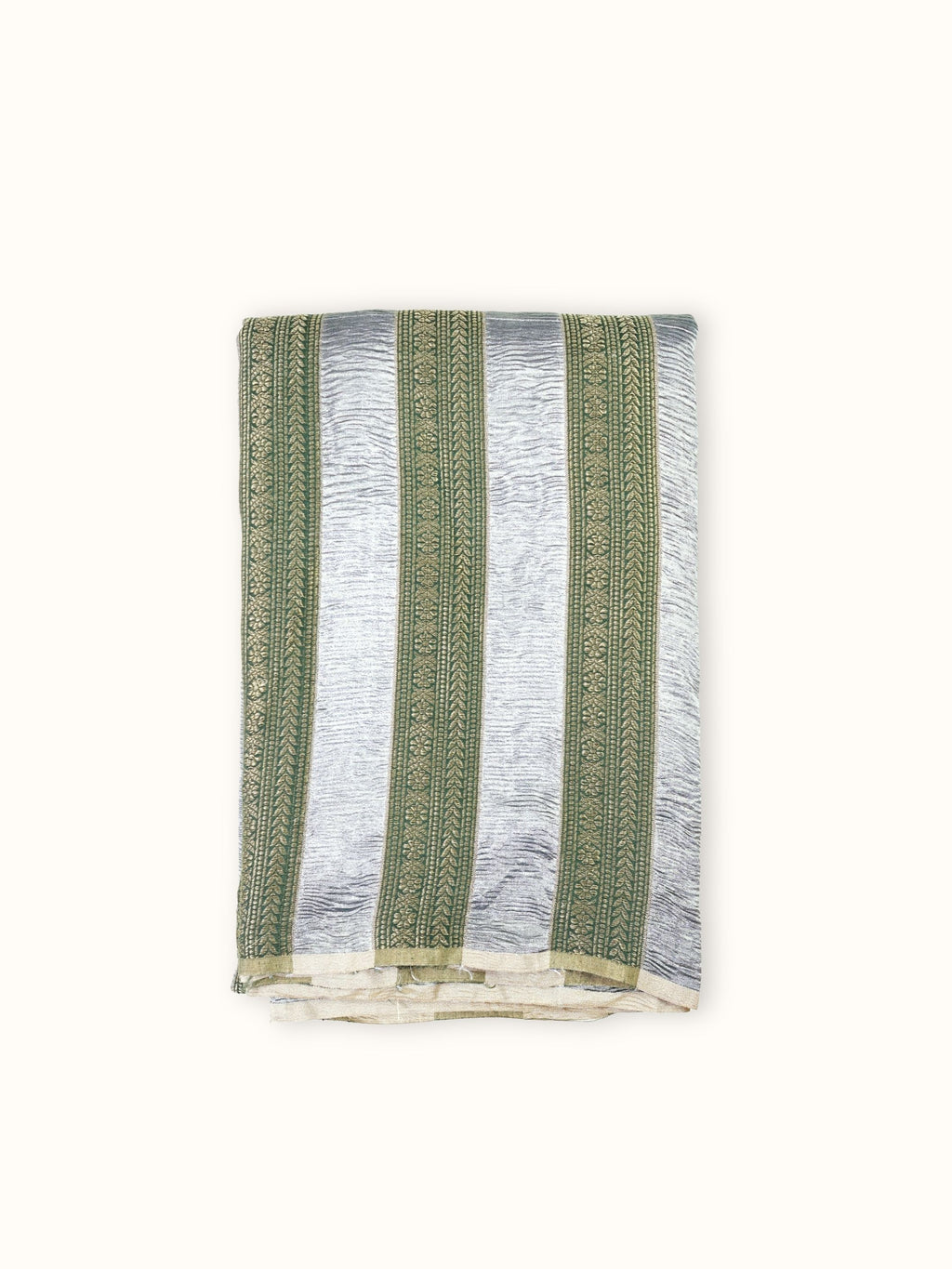 Forest green Muga stripe silk saree folded, with silver tissue stripes