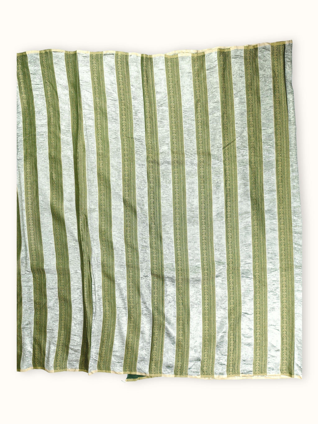 Saree laid open, green and silver stripes down the body