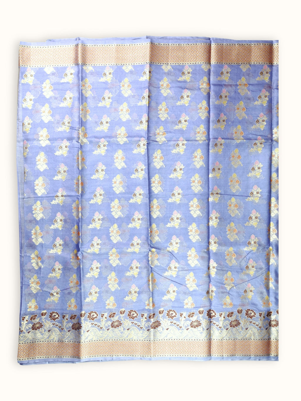 Saree laid open, flowering sprays across the body