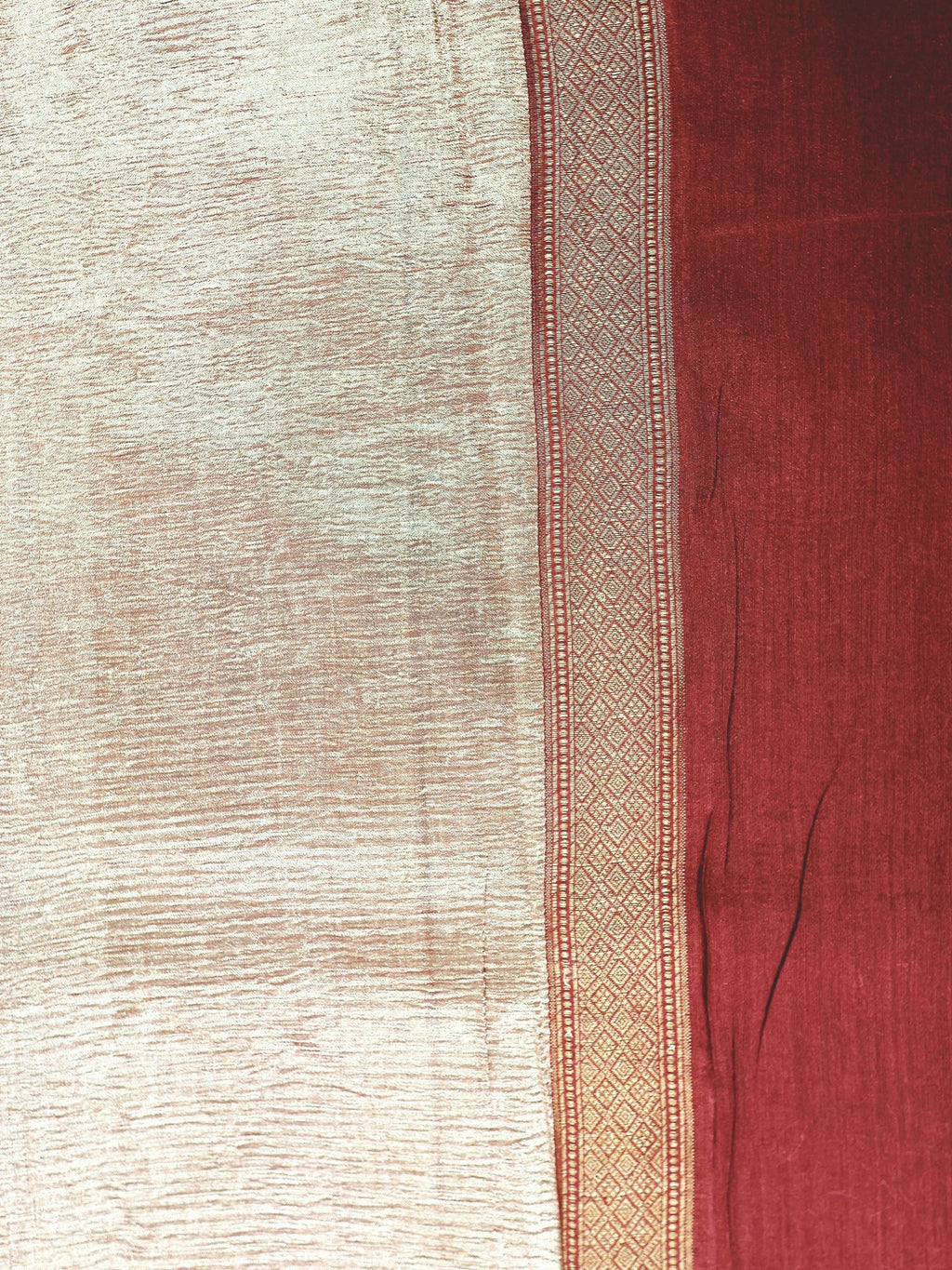 Gold tissue and diamond-woven border in close detail