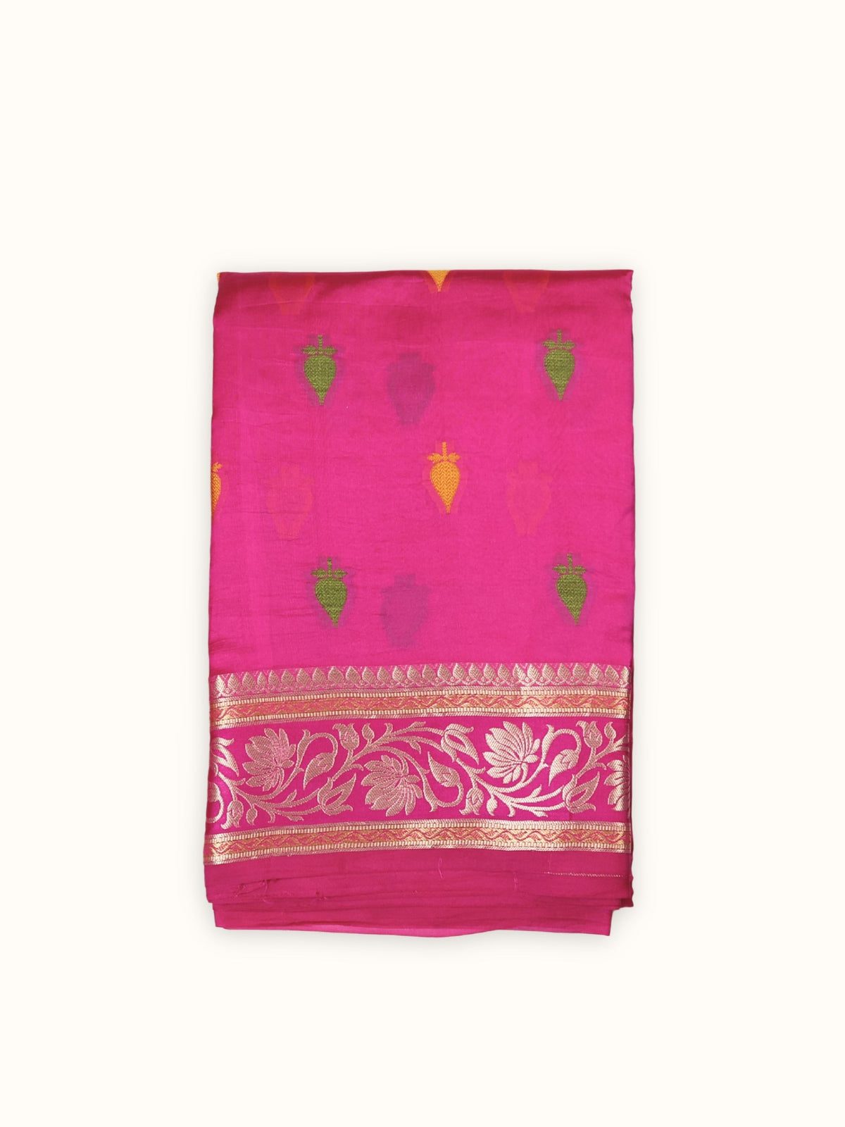 Rani pink Dupian silk saree folded, with green and gold butis and a lotus border