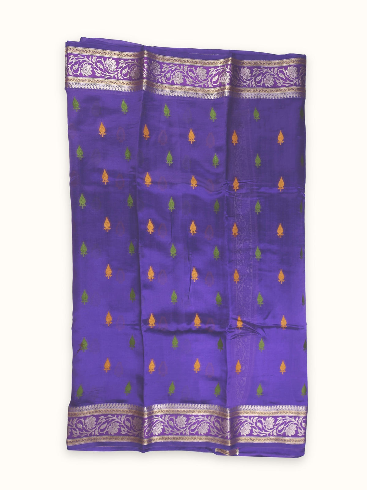 Saree laid open, meena butis across the body