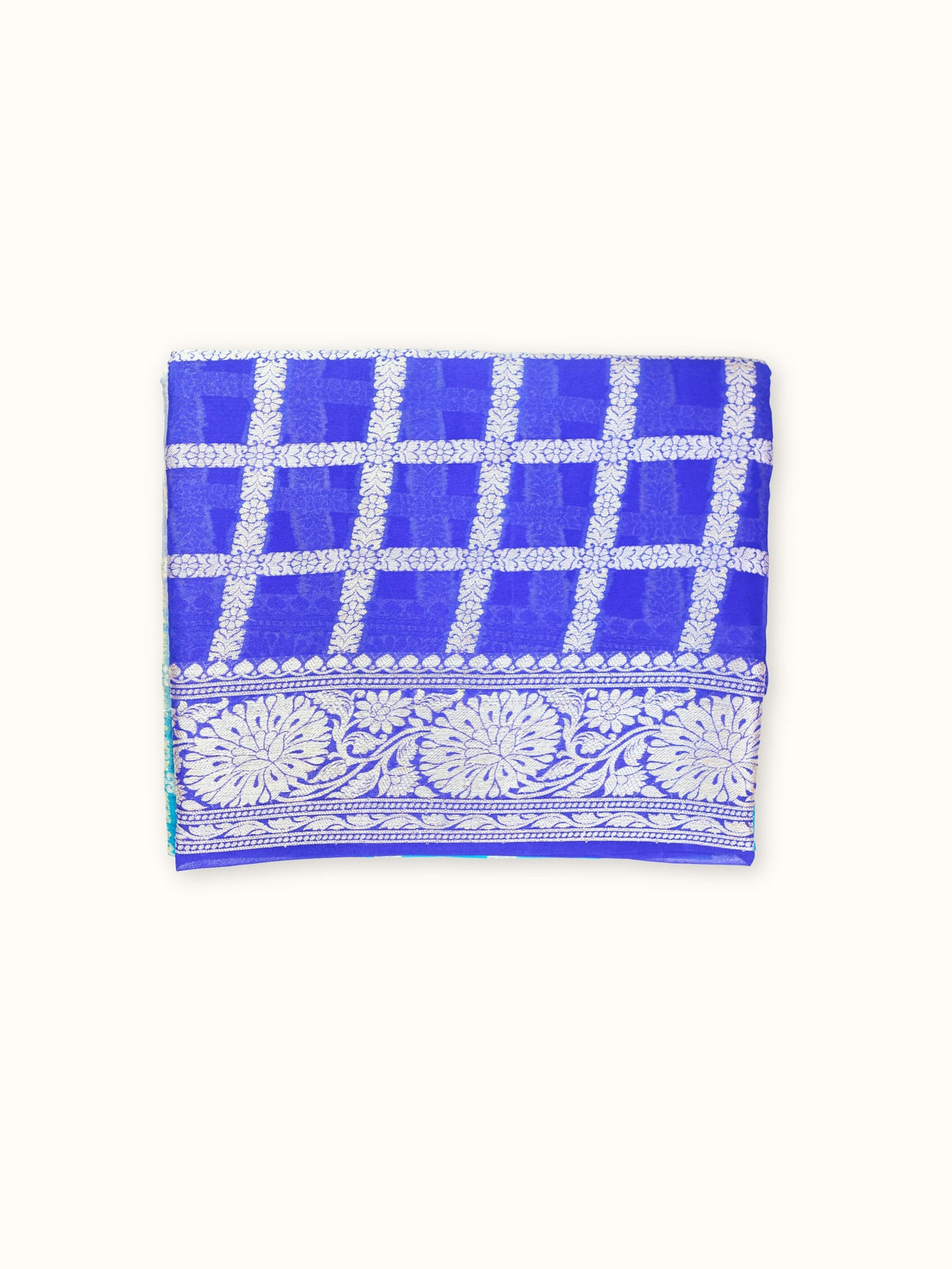 Sapphire to Ivory Chiffon Saree with Silver Lattice Jaal, folded
