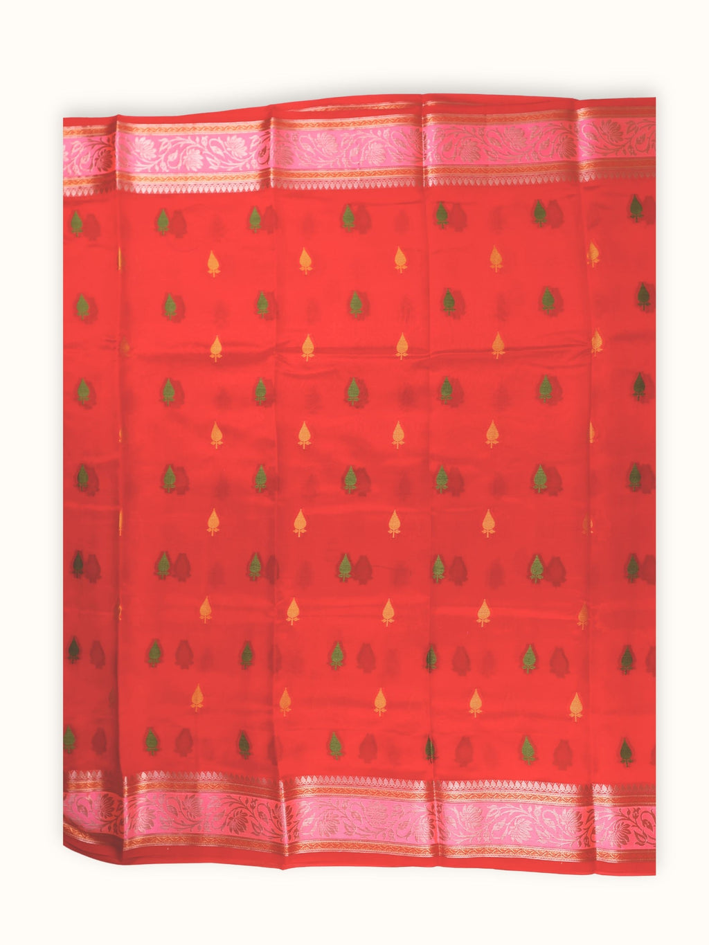 Saree laid open, meena butis across the scarlet body