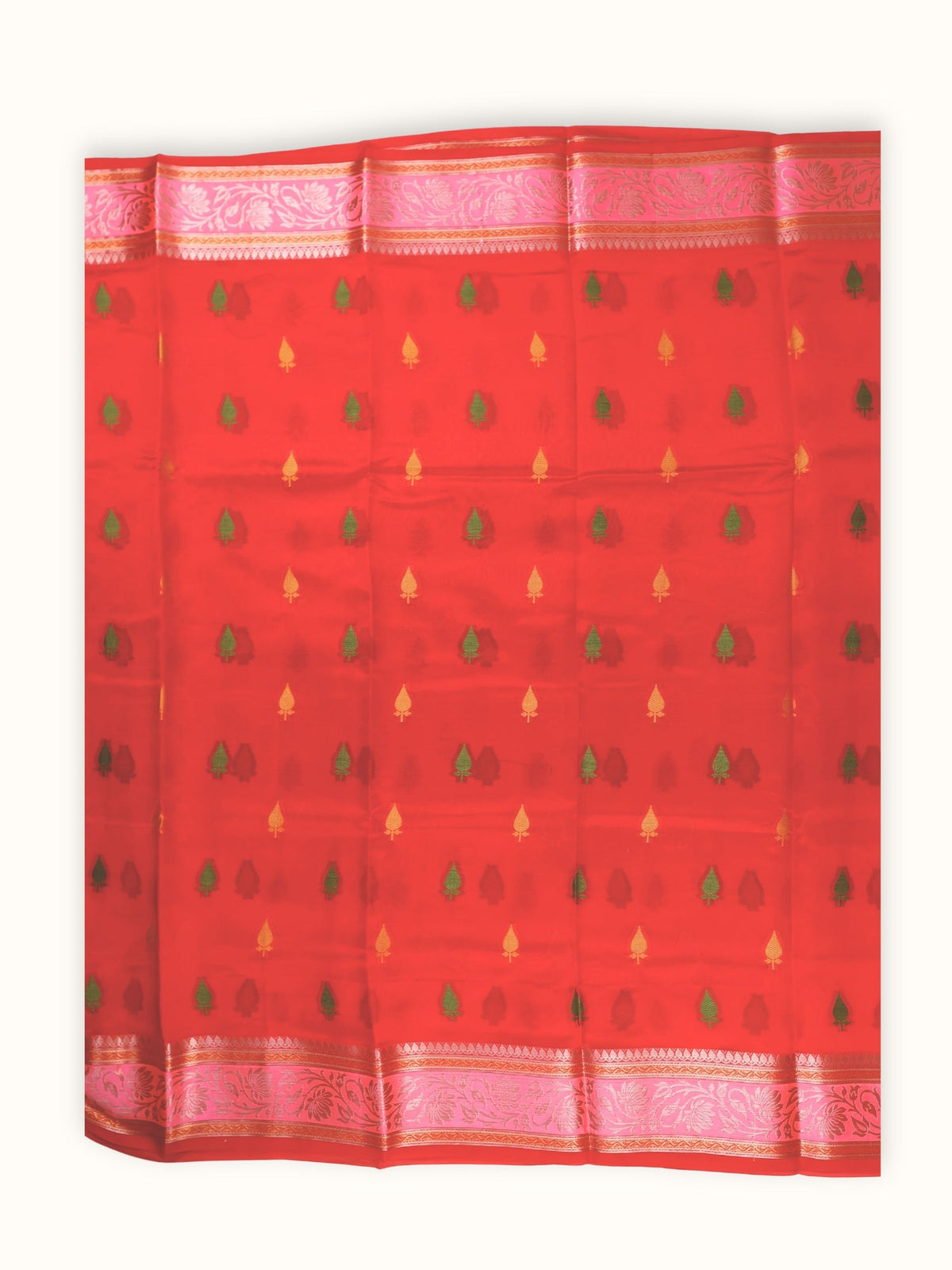Saree laid open, meena butis across the scarlet body