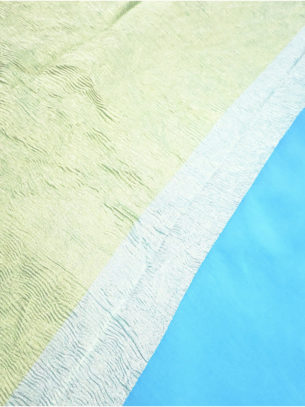 Sky Blue Khaddi Georgette Handloom Saree with Zari Waves, close detail of the weave
