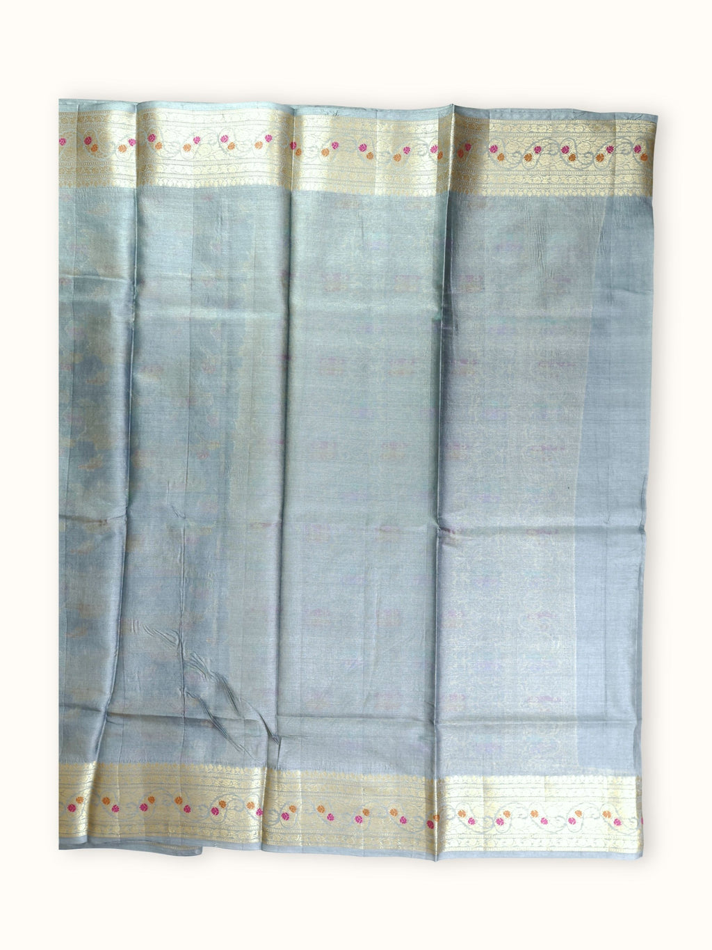 Plain slate blue blouse piece with a floral border